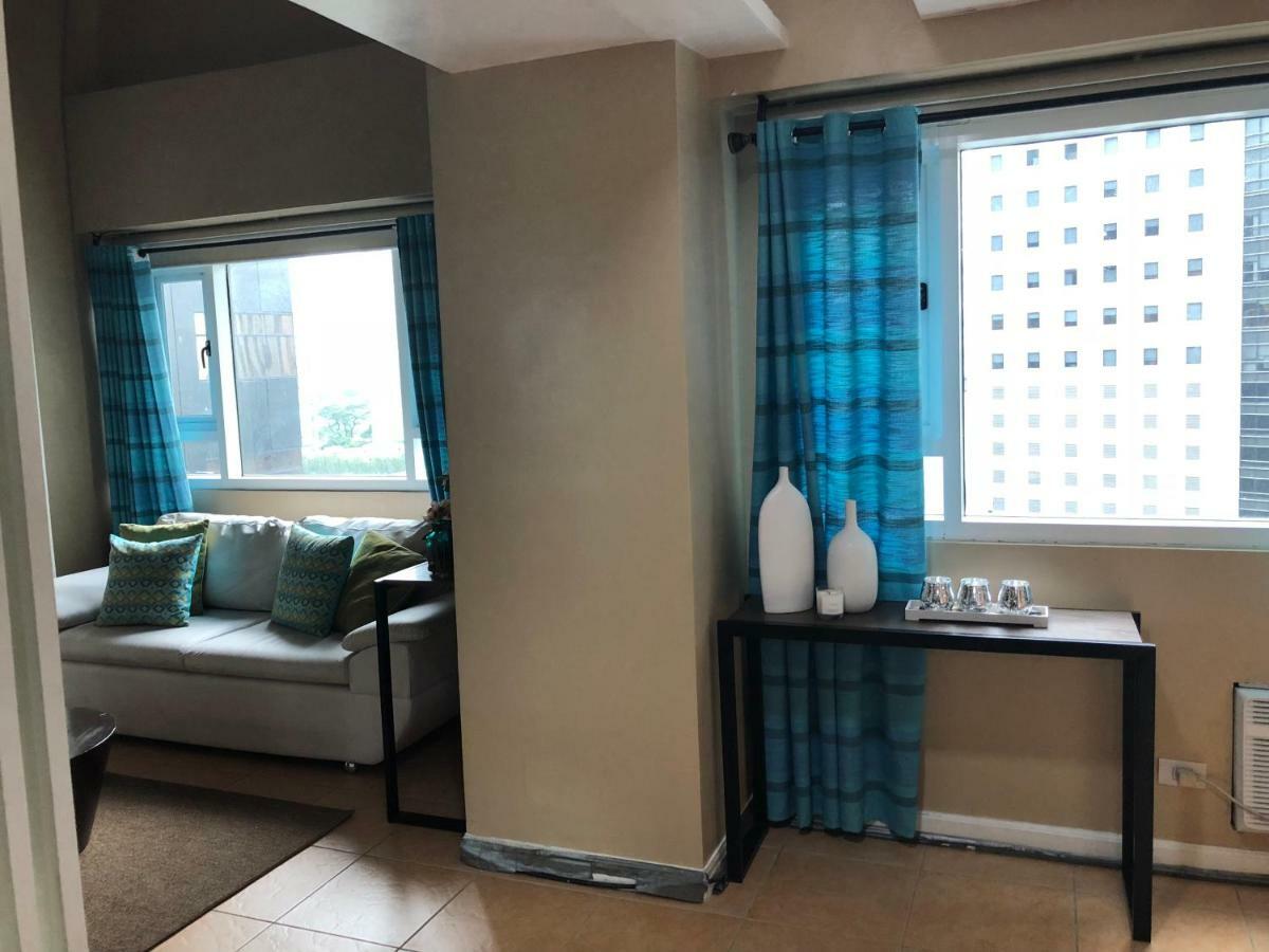 Loft Condo Beside Shangri-La Fort Manila Kültér fotó