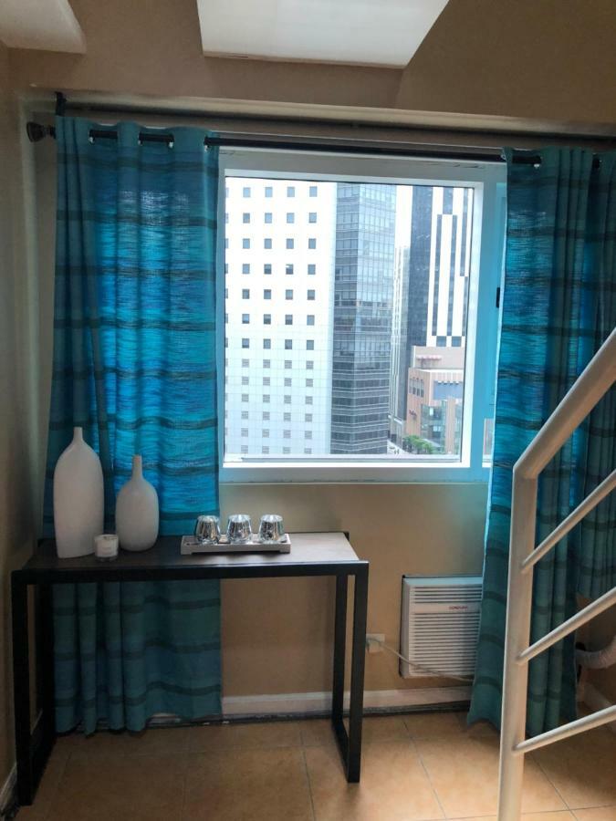 Loft Condo Beside Shangri-La Fort Manila Kültér fotó